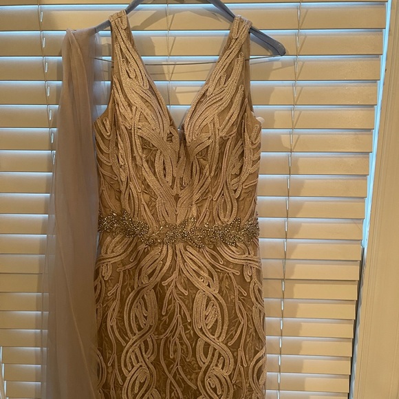 Mon Cheri intricate lace and beaded gown in champagne. - Picture 4 of 7